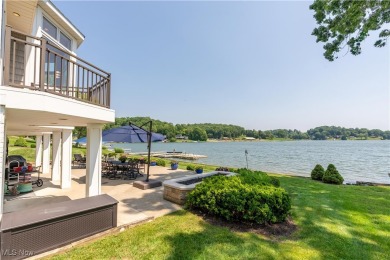 Live the lakefront dream at this exceptional 4-bedroom, 5.5-bath on Lake Mohawk Golf Club in Ohio - for sale on GolfHomes.com, golf home, golf lot
