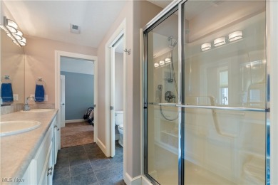 Live the lakefront dream at this exceptional 4-bedroom, 5.5-bath on Lake Mohawk Golf Club in Ohio - for sale on GolfHomes.com, golf home, golf lot