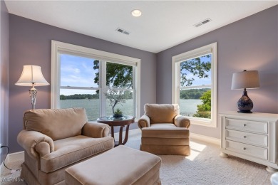 Live the lakefront dream at this exceptional 4-bedroom, 5.5-bath on Lake Mohawk Golf Club in Ohio - for sale on GolfHomes.com, golf home, golf lot