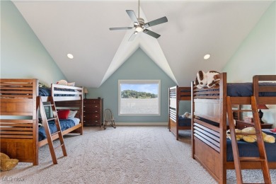Live the lakefront dream at this exceptional 4-bedroom, 5.5-bath on Lake Mohawk Golf Club in Ohio - for sale on GolfHomes.com, golf home, golf lot