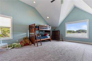 Live the lakefront dream at this exceptional 4-bedroom, 5.5-bath on Lake Mohawk Golf Club in Ohio - for sale on GolfHomes.com, golf home, golf lot