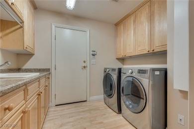 Welcome to this stunning 2-story home in the exclusive Summerlin on TPC at Summerlin in Nevada - for sale on GolfHomes.com, golf home, golf lot
