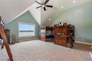 Live the lakefront dream at this exceptional 4-bedroom, 5.5-bath on Lake Mohawk Golf Club in Ohio - for sale on GolfHomes.com, golf home, golf lot