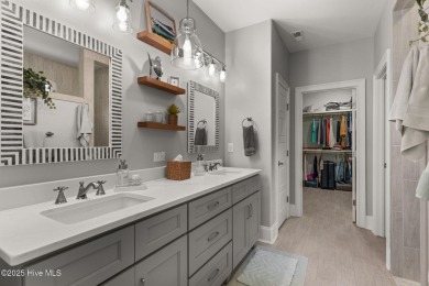 Welcome to this stunning, nearly-new home nestled in the on Members Club At St. James Plantation in North Carolina - for sale on GolfHomes.com, golf home, golf lot