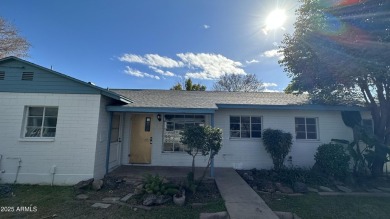 This charming townhome is an ideal opportunity for investors or on Encanto 18 Golf Course in Arizona - for sale on GolfHomes.com, golf home, golf lot