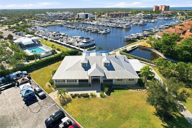 This highly sought-after residence at Marina North Shore in on Burnt Store Golf Club in Florida - for sale on GolfHomes.com, golf home, golf lot