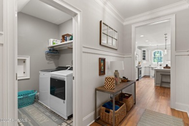 Welcome to this stunning, nearly-new home nestled in the on Members Club At St. James Plantation in North Carolina - for sale on GolfHomes.com, golf home, golf lot