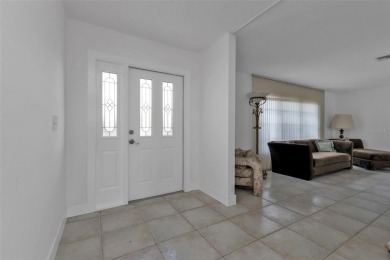 A true boater's dream, nestled just steps from the open waters on Saint Andrews South Golf Club in Florida - for sale on GolfHomes.com, golf home, golf lot