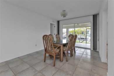 A true boater's dream, nestled just steps from the open waters on Saint Andrews South Golf Club in Florida - for sale on GolfHomes.com, golf home, golf lot