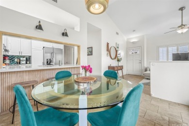 Discover comfort and convenience in this single-level end unit on Hoakalei Country Club At Ocean Pointe in Hawaii - for sale on GolfHomes.com, golf home, golf lot