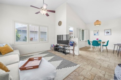 Discover comfort and convenience in this single-level end unit on Hoakalei Country Club At Ocean Pointe in Hawaii - for sale on GolfHomes.com, golf home, golf lot