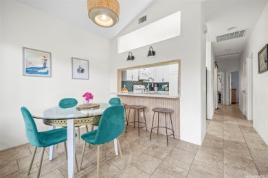 Discover comfort and convenience in this single-level end unit on Hoakalei Country Club At Ocean Pointe in Hawaii - for sale on GolfHomes.com, golf home, golf lot