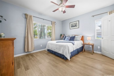 Discover comfort and convenience in this single-level end unit on Hoakalei Country Club At Ocean Pointe in Hawaii - for sale on GolfHomes.com, golf home, golf lot