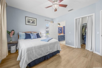 Discover comfort and convenience in this single-level end unit on Hoakalei Country Club At Ocean Pointe in Hawaii - for sale on GolfHomes.com, golf home, golf lot