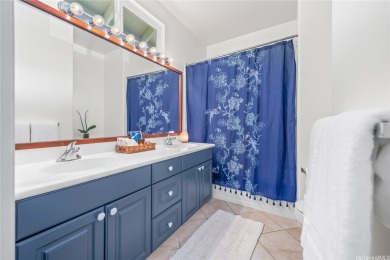 Discover comfort and convenience in this single-level end unit on Hoakalei Country Club At Ocean Pointe in Hawaii - for sale on GolfHomes.com, golf home, golf lot