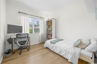 Discover comfort and convenience in this single-level end unit on Hoakalei Country Club At Ocean Pointe in Hawaii - for sale on GolfHomes.com, golf home, golf lot