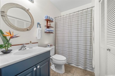 Discover comfort and convenience in this single-level end unit on Hoakalei Country Club At Ocean Pointe in Hawaii - for sale on GolfHomes.com, golf home, golf lot