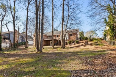 This beautifully remodeled 3-bedroom, 2-bath brick ranch is the on Honey Creek Country Club in Georgia - for sale on GolfHomes.com, golf home, golf lot