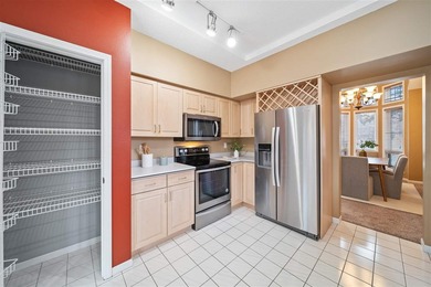 Situated on over a half-acre double lot among mature trees and on Brown Deer Golf Club in Iowa - for sale on GolfHomes.com, golf home, golf lot