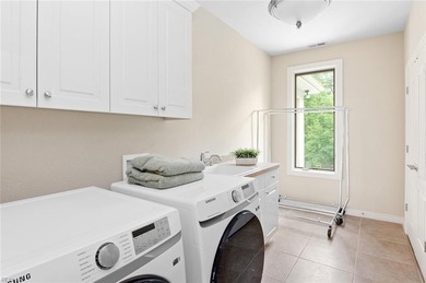 Experience luxury living in this Showcase Home-a-Rama estate on Riverfront Golf Club in Virginia - for sale on GolfHomes.com, golf home, golf lot