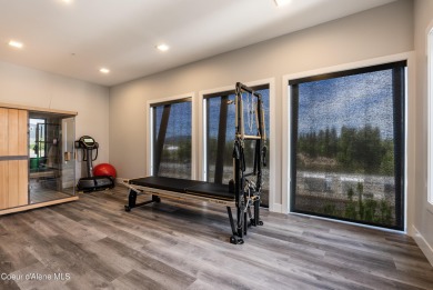 Spanning 2,950 sq. ft., this luxurious 4-bedroom, 4-bathroom on Sandpoint Elks Golf Course in Idaho - for sale on GolfHomes.com, golf home, golf lot