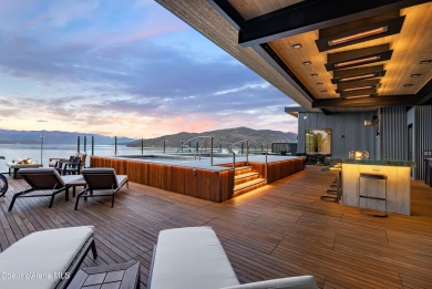 Spanning 2,950 sq. ft., this luxurious 4-bedroom, 4-bathroom on Sandpoint Elks Golf Course in Idaho - for sale on GolfHomes.com, golf home, golf lot