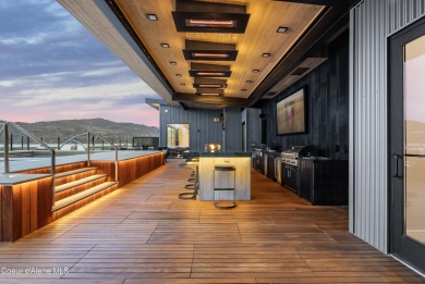 Spanning 2,950 sq. ft., this luxurious 4-bedroom, 4-bathroom on Sandpoint Elks Golf Course in Idaho - for sale on GolfHomes.com, golf home, golf lot