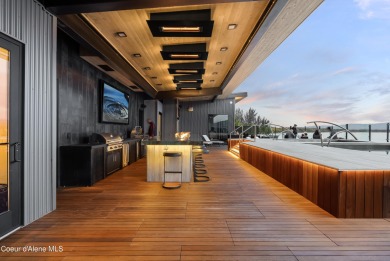 Spanning 2,950 sq. ft., this luxurious 4-bedroom, 4-bathroom on Sandpoint Elks Golf Course in Idaho - for sale on GolfHomes.com, golf home, golf lot