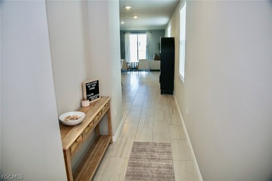 Welcome to this beautiful four-bedroom, two-bath home located on Babcock National Golf Course in Florida - for sale on GolfHomes.com, golf home, golf lot