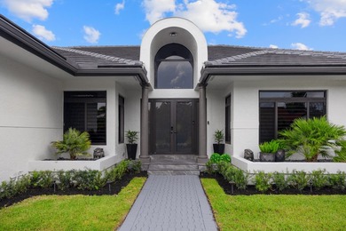 Exquisitely updated 4-bedroom, 4.5 bath estate home with on Stonebridge Golf and Country Club in Florida - for sale on GolfHomes.com, golf home, golf lot