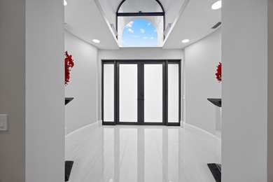 Exquisitely updated 4-bedroom, 4.5 bath estate home with on Stonebridge Golf and Country Club in Florida - for sale on GolfHomes.com, golf home, golf lot