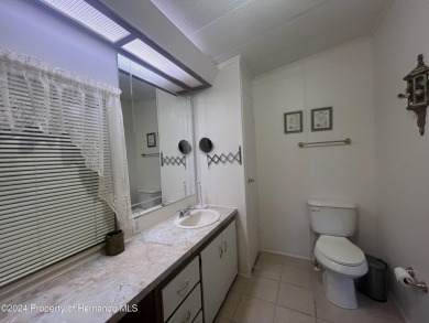 This fully furnished two-bedroom, two-bathroom house offers on High Point Golf Club, Inc. in Florida - for sale on GolfHomes.com, golf home, golf lot