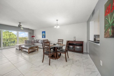 Enjoy Effortless Condo Living with Golf Course Views! Welcome to on East Bay Golf Club in Florida - for sale on GolfHomes.com, golf home, golf lot