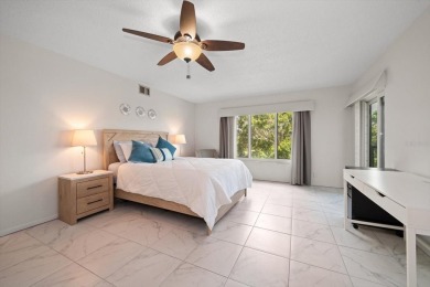 Enjoy Effortless Condo Living with Golf Course Views! Welcome to on East Bay Golf Club in Florida - for sale on GolfHomes.com, golf home, golf lot