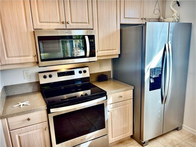 Welcome to Florida living at its finest in this stunning 3 on Capri Isle Golf Club in Florida - for sale on GolfHomes.com, golf home, golf lot