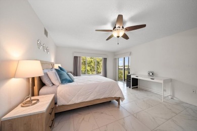 Enjoy Effortless Condo Living with Golf Course Views! Welcome to on East Bay Golf Club in Florida - for sale on GolfHomes.com, golf home, golf lot