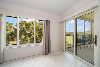 Enjoy Effortless Condo Living with Golf Course Views! Welcome to on East Bay Golf Club in Florida - for sale on GolfHomes.com, golf home, golf lot