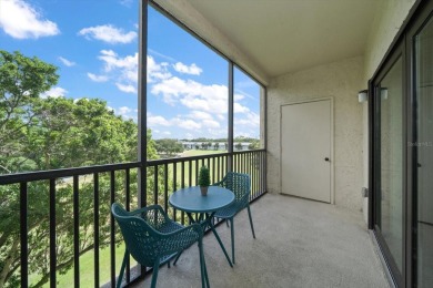 Enjoy Effortless Condo Living with Golf Course Views! Welcome to on East Bay Golf Club in Florida - for sale on GolfHomes.com, golf home, golf lot