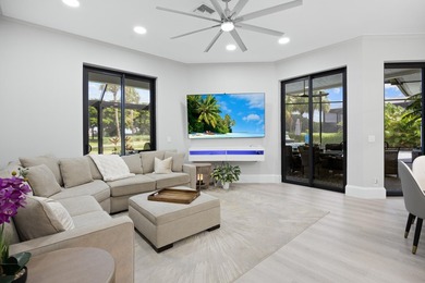 Exquisitely updated 4-bedroom, 4.5 bath estate home with on Stonebridge Golf and Country Club in Florida - for sale on GolfHomes.com, golf home, golf lot