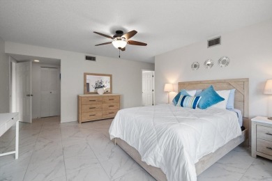 Enjoy Effortless Condo Living with Golf Course Views! Welcome to on East Bay Golf Club in Florida - for sale on GolfHomes.com, golf home, golf lot