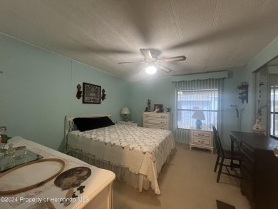 This fully furnished two-bedroom, two-bathroom house offers on High Point Golf Club, Inc. in Florida - for sale on GolfHomes.com, golf home, golf lot