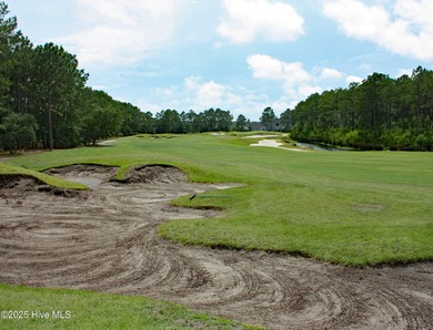 Opportunity knocks! Prime Golf course homesite with pond views on Ocean Ridge Plantation in North Carolina - for sale on GolfHomes.com, golf home, golf lot