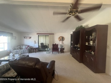 This fully furnished two-bedroom, two-bathroom house offers on High Point Golf Club, Inc. in Florida - for sale on GolfHomes.com, golf home, golf lot