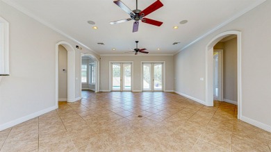 Mediterranean Estate with Marsh Views & Saltwater Pool in a on Marsh Valley Country Club in Florida - for sale on GolfHomes.com, golf home, golf lot