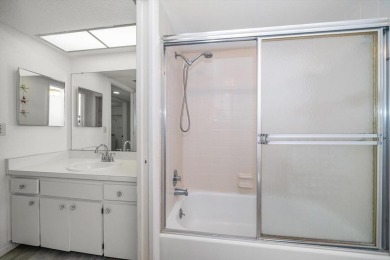 Enjoy Effortless Condo Living with Golf Course Views! Welcome to on East Bay Golf Club in Florida - for sale on GolfHomes.com, golf home, golf lot