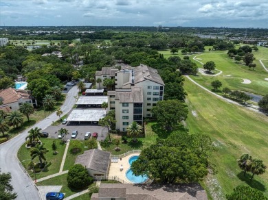 Enjoy Effortless Condo Living with Golf Course Views! Welcome to on East Bay Golf Club in Florida - for sale on GolfHomes.com, golf home, golf lot
