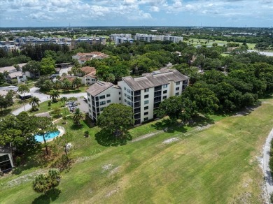 Enjoy Effortless Condo Living with Golf Course Views! Welcome to on East Bay Golf Club in Florida - for sale on GolfHomes.com, golf home, golf lot