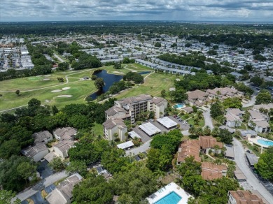 Enjoy Effortless Condo Living with Golf Course Views! Welcome to on East Bay Golf Club in Florida - for sale on GolfHomes.com, golf home, golf lot