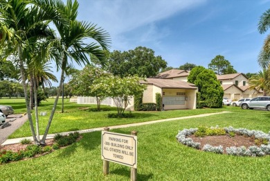 Enjoy Effortless Condo Living with Golf Course Views! Welcome to on East Bay Golf Club in Florida - for sale on GolfHomes.com, golf home, golf lot