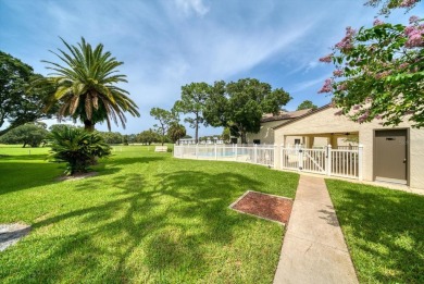 Enjoy Effortless Condo Living with Golf Course Views! Welcome to on East Bay Golf Club in Florida - for sale on GolfHomes.com, golf home, golf lot